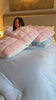 Puff pillow shown in pink and grey colourways