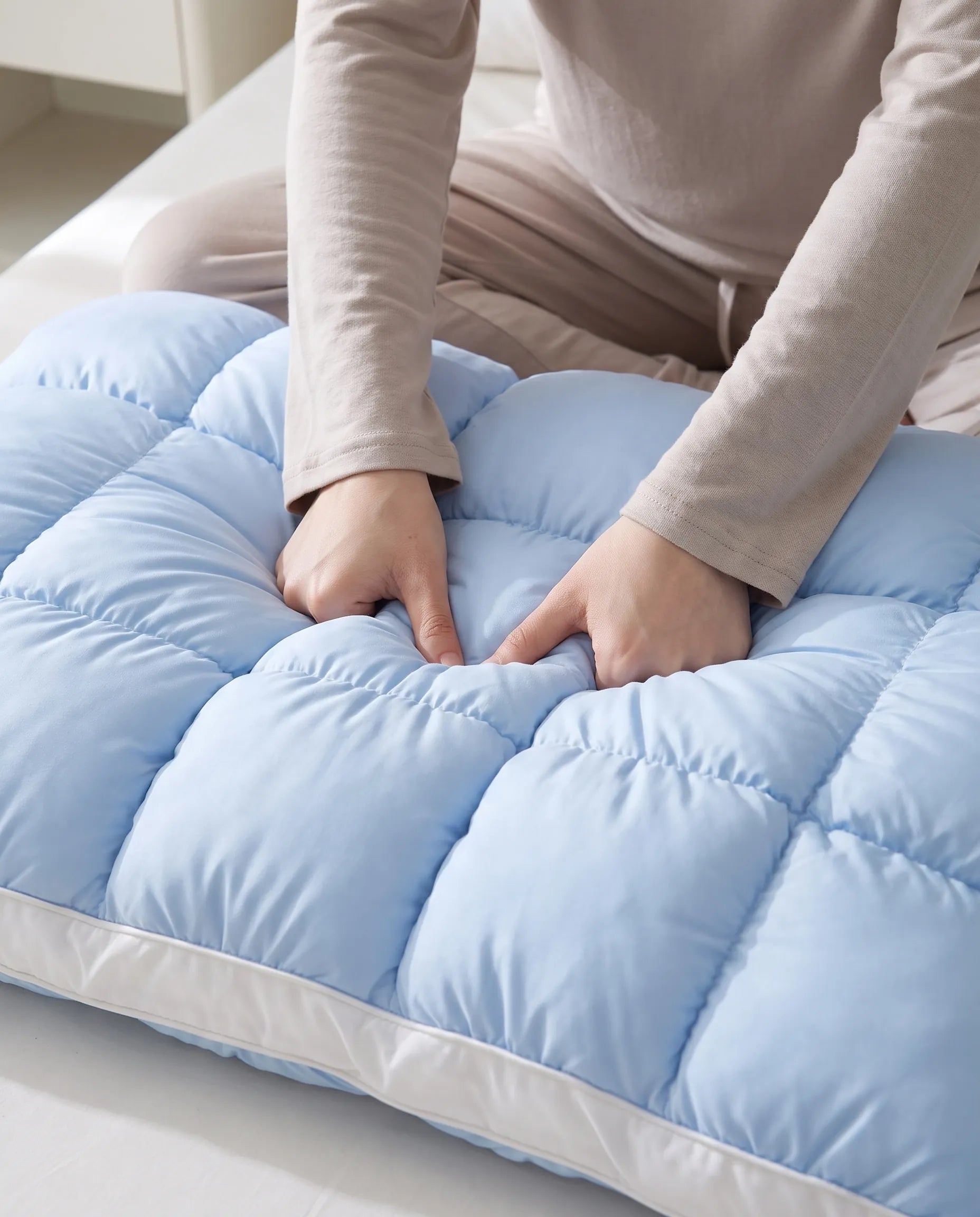 Quilted cells compressing under fingers